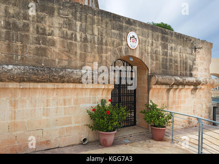 Door to top section of Fort St. Angelo (Malta). Inscription above the door: 'Sovereign Military Order of Malta. Fort St. Angelo. Top Section' Stock Photo