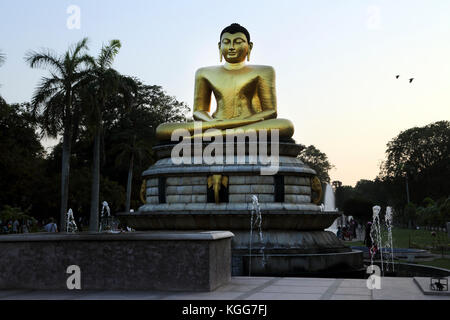 Viharamahadevi Park Hunupitiva Colombo Sri Lanka  large gilded Buddha in the Dhyana Mudra seated in the Ardha Padmasana position Stock Photo