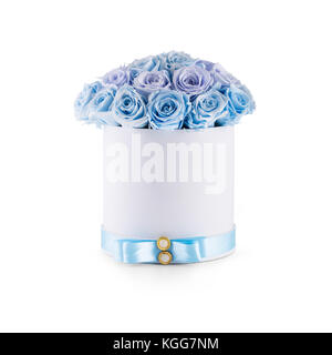 Bouquet of blue flowers roses in luxury gift box isolated  of white. Stock Photo