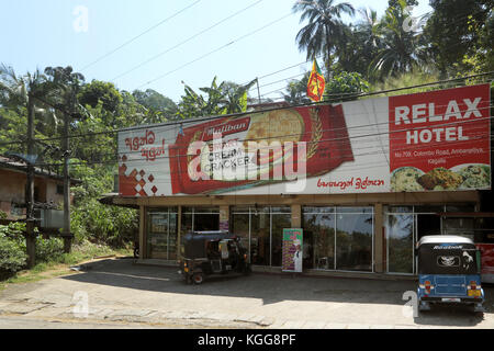 Ambanpitiya Colombo Road Sri Lanka Smart Cream Cracker advertisement above Restaurant Stock Photo