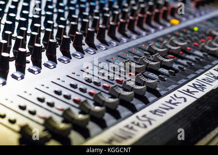 Mixer Board used by the engineer to adjust the quality of the music. Stock Photo