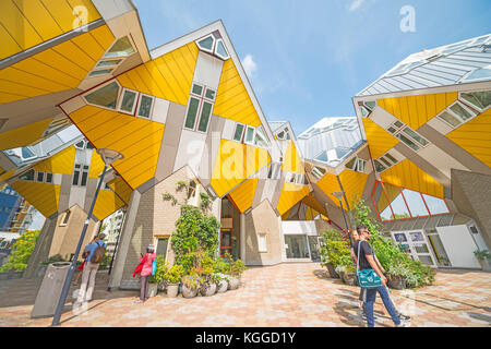 ROTTERDAM, HOLLAND - AUGUST 22, 2017; Cube houses of Rotterdam, a quirky bright yellow architecturally unusual angular cube shape apartment block focu Stock Photo