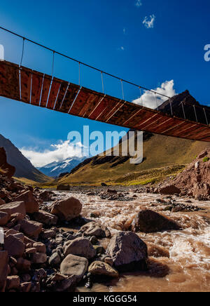 Suspension Bridge over Horcones River, Aconcagua Mountain, Aconcagua Provincial Park, Central Andes, Mendoza Province, Argentina Stock Photo