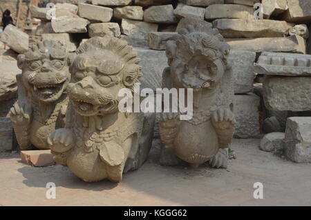 Newari stone carving sculpture of 3 dragons in Bhaktapur, Nepal. After earthquake. Stock Photo