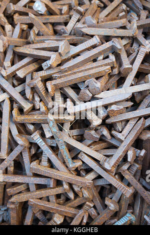 Old rusty railroad spikes Stock Photo