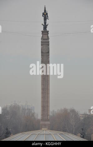 Monument of Independence, Kazakhstan, Republic Square, Almaty. Saka warrior with leopard and arrows and bow. Stock Photo