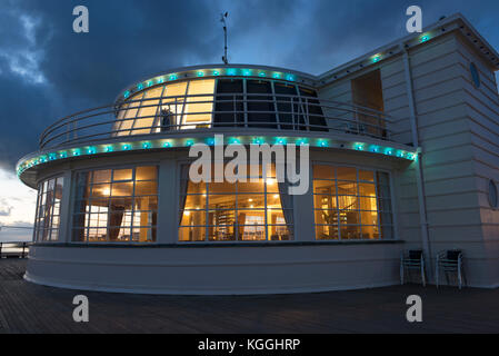 The art-deco Southern Pavilion on Worthing Pier on a November evening shortly after sunset Stock Photo