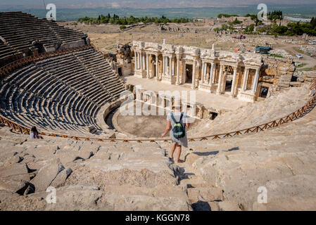People visit The ruins of Antique Theater in ancient Greek city Hierapolis, Pamukkale, Turkey.25 August 2017 Stock Photo