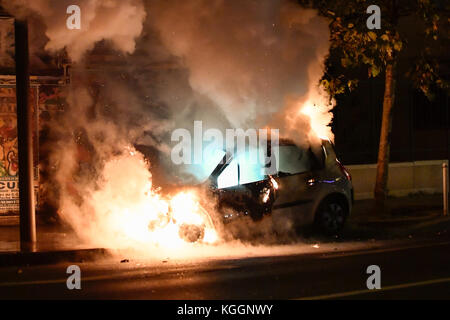 Julien Mattia / Le Pictorium -  Car on fire -  08/11/2017  -  France / ? haut de seine ? / Malakoff  -  Paris firefighters extinguish a burnt car in Malakoff. Of unknown origin the engine fire threatens an abandoned building, forcing the Paris fire to intervene in the building after extinguishing the fire. Stock Photo