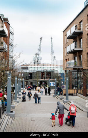 Shoppers on Gaol Ferry Steps at Wapping Wharf in Bristol Harbour UK Stock Photo