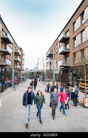 Shoppers on Gaol Ferry Steps at Wapping Wharf in Bristol Harbour UK Stock Photo