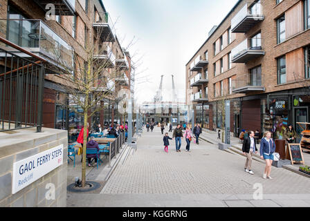 Shoppers on Gaol Ferry Steps at Wapping Wharf in Bristol Harbour UK Stock Photo