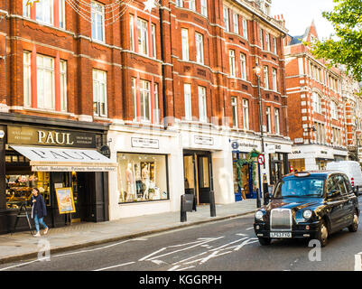 A row of boutique shops in Marylebone High Street London Stock