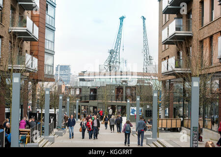 Shoppers on Gaol Ferry Steps at Wapping Wharf in Bristol Harbour UK Stock Photo