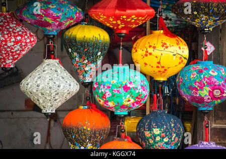 Bright, colorful lanterns in a shop in Southeast Asian village, Hoi An, Vietnam