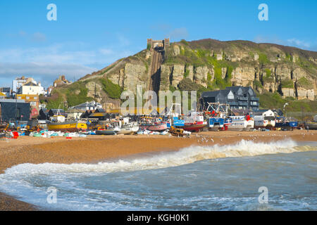 Hastings fishing boats pulled up above the high tide line on the Old Town Stade Fishermen's Beach, Rock-a-Nore, East Sussex, UK Stock Photo