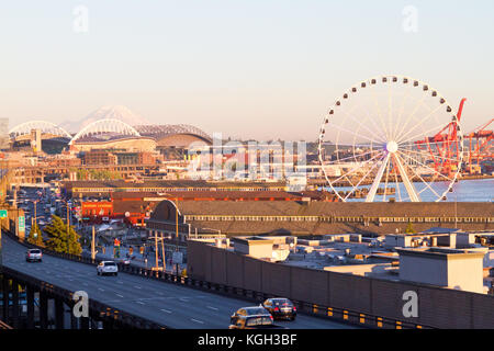 Elevated view of  Pier 57 showing Miners Landing, the Great Wheel, and Mt. Rainier in the late afternoon sun. Stock Photo
