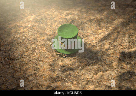 A concept image showing a tiny leprechaun hat apparently lost on the ground in the day time - 3D render Stock Photo