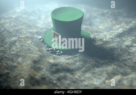 A concept image showing a tiny leprechaun hat apparently lost on the ground at night - 3D render Stock Photo