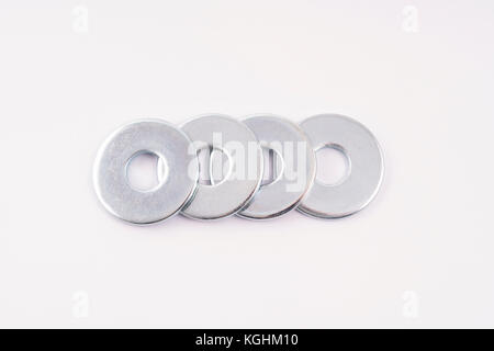 Metallic o-rings on a white background Stock Photo