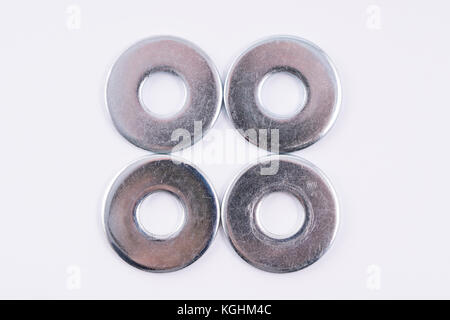 Metallic o-rings on a white background Stock Photo