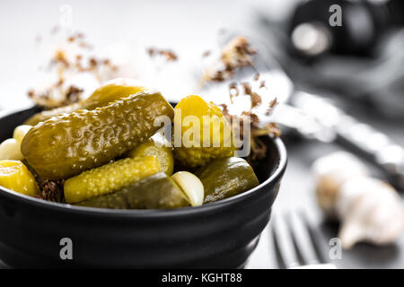 Pickled cucumbers, small marinated pickles, gherkins Stock Photo
