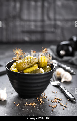 Pickled cucumbers, small marinated pickles, gherkins Stock Photo