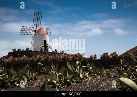 Historic windmill In Lanzarote, Spain. With copyspace, good for renewable energies, wind power, environmental protection concept. Stock Photo