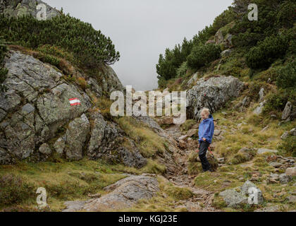 A woman hiking in the Austrian Mountains