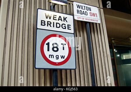 Weak bridge sign 18 ton restriction, Wilton Road, Victoria, London, UK Stock Photo