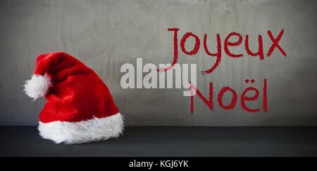 Santa Hat, Joyeux Noel Means Merry Christmas Stock Photo