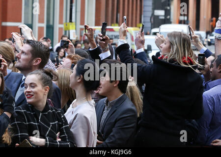 UBS. London, UK. 8th Nov, 2017. Members of public takes photographs and video of Duchess of Cambridge's arrival. Kate Middleton, the Duchess of Cambridge arrives at UBS for Place2Be's School Leaders Forum as part of her ongoing work on the mental health and wellbeing of children. The Duchess will open the conference and join delegates at the forum as they consider the key issues and latest thinking on the role that schools can play in tackling mental health problems early in life. Credit: Dinendra Haria/Alamy Live News Stock Photo