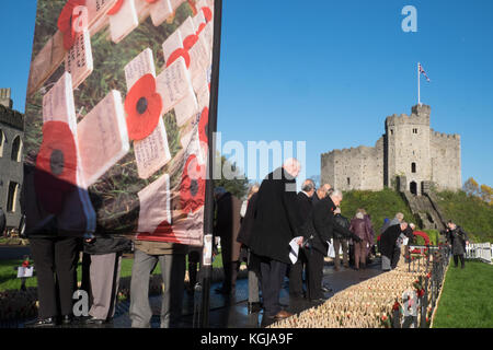 Cardiff, UK. 8th Nov, 2017.The Royal British Legion Field of Remembrance Service held at Cardiff Castle, centre of Cardiff, Wales, UK, on a sunny blue sky but chilly morning.Dignitaries included Secretary of State for Wales, First Minister of Wales, and included dedication and prayers led by The Reverend Canon Stewart Lisk. The official opening of the Cardiff Field of Remembrance took place on Wednesday 8 November at 11am. Credit: Paul Quayle/Alamy Live News Stock Photo