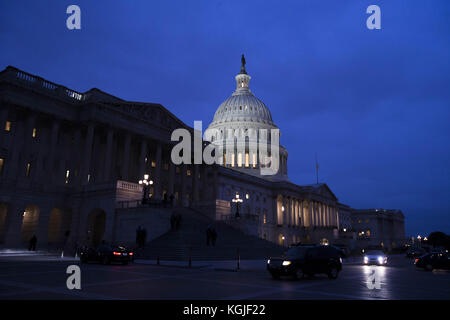 Washington, District Of Columbia, USA. 8th Nov, 2017. The United States flag flies at half staff over the United States Capitol at dusk on November 8th, 2017 in Washington, DC The flag is at half staff in the wake of a mass shooting in Texas this past weekend. Credit: Alex Edelman/ZUMA Wire/Alamy Live News Stock Photo