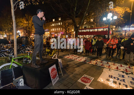 London, UK. 8th November 2017. The Stop Killing Cyclists die-in and vigil begins outside Islington Town Hall to honour Jerome Roussel, who died in  hospital seven weeks after he was hit an HGV while cycling on Pentonville Rd, and whose inquest opened today. Credit: Peter Marshall/Alamy Live News Stock Photo