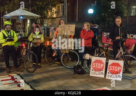 London, UK. 8th November 2017. People and posters at the Stop Killing Cyclists  die-in and vigil outside Islington Town Hall to honour Jerome Roussel, who died in  hospital seven weeks after he was hit an HGV while cycling on Pentonville Rd, and whose inquest opened today. Credit: Peter Marshall/Alamy Live News Stock Photo