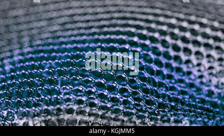 Blue abstract texture from mesh. Artistic detail of hexagonal grid in HD 16x9 ratio. Concept for science, research, technology and industry. Stock Photo