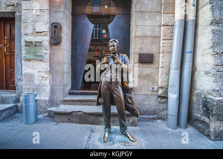 Leopold von Sacher-Masoch statue in front of famous Masoch Cafe and Bar on the Old Town of Lviv city, largest city in western Ukraine Stock Photo