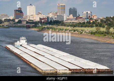 NASHVILLE, TN - OCT 10: Barge moves goods along the Mississippi river near downtown Memphis, Tennessee on October 10, 2017 Stock Photo