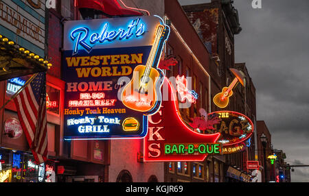 NASHVILLE, TN - OCT 8: Neon signs light the strip along Broadway on October 8, 2017 in Nashville, Tennessee, USA Stock Photo