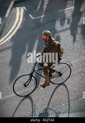 Cycling into Brighton on an ancient bicycle Stock Photo