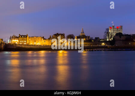 Rochester Castle, Cathedral and the buildings on Esplanade taken during the Blue Hour after sunset from across the River Medway at Strood, Kent, UK. Stock Photo