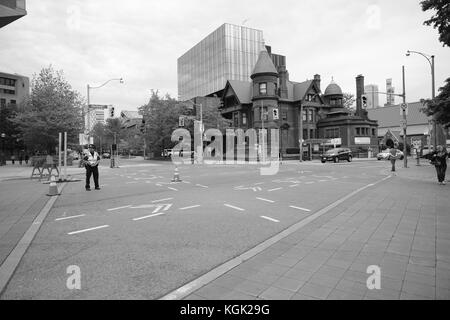 A sparsely-filled Toronto intersection. Just a simple attempt at capturing a pocket of quiet life in a city bustling with noise. Stock Photo