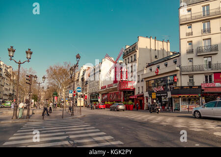 Paris, France, March 31 2017: Moulin Rouge is a famous cabaret built in 1889, locating in the Paris red-light district of Pigalle Stock Photo