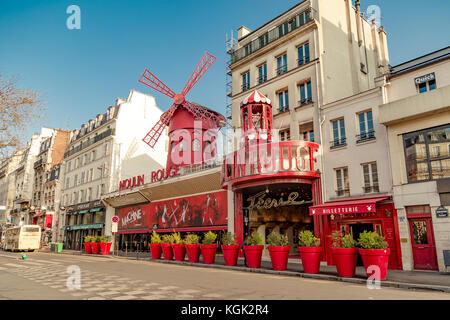 Paris, France, March 31 2017: Moulin Rouge is a famous cabaret built in 1889, locating in the Paris red-light district of Pigalle Stock Photo