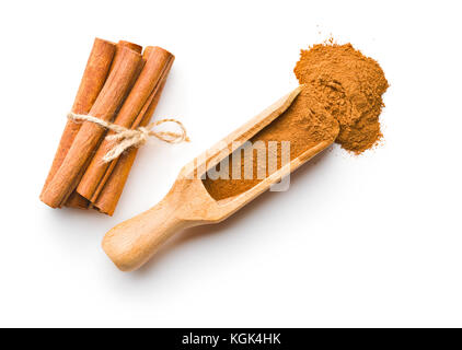 Cinnamon sticks and milled cinnamon isolated on white background. Stock Photo
