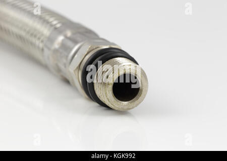 steel flexible hydraulic hose close up in studio Stock Photo