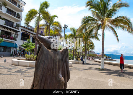 PUERTO VALLARTA, MEXICO - SEPTEMBER 6, 2015: Searching for Reason statue at Puerto Vallarta, Mexico. Sculpure was made by Sergio Bustamante in 2000. Stock Photo