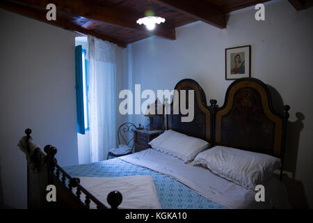 the master bedroom in an old country house in the village of Bortigali, Sardinia, Italy Stock Photo