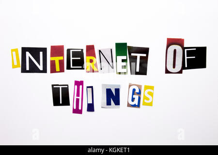 A word writing text showing concept of Internet Of Things made of different magazine newspaper letter for Business case on the white background with c Stock Photo